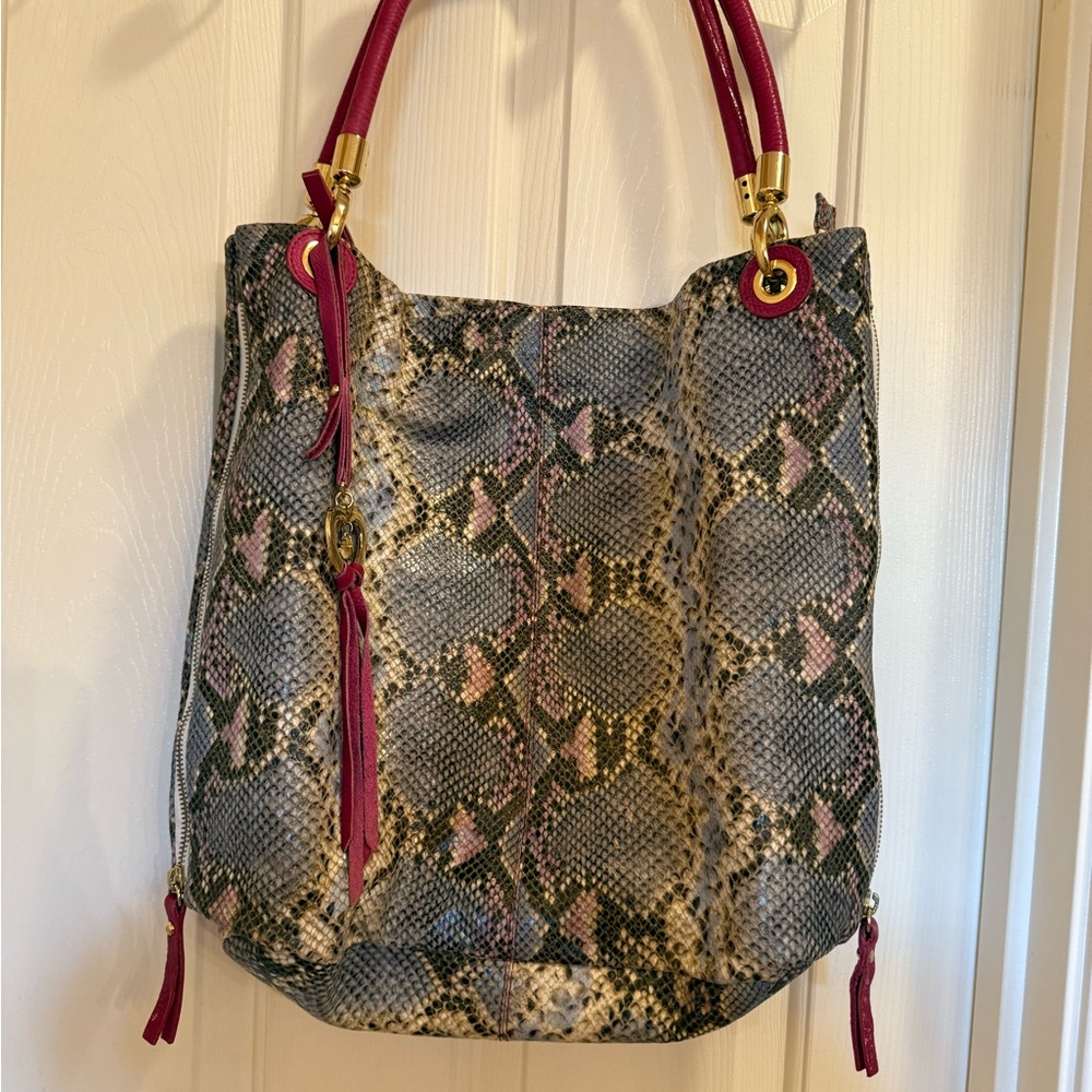 Stylish Genuine Leather Snake Print Tote Bag with Pink & Goltone Accents.